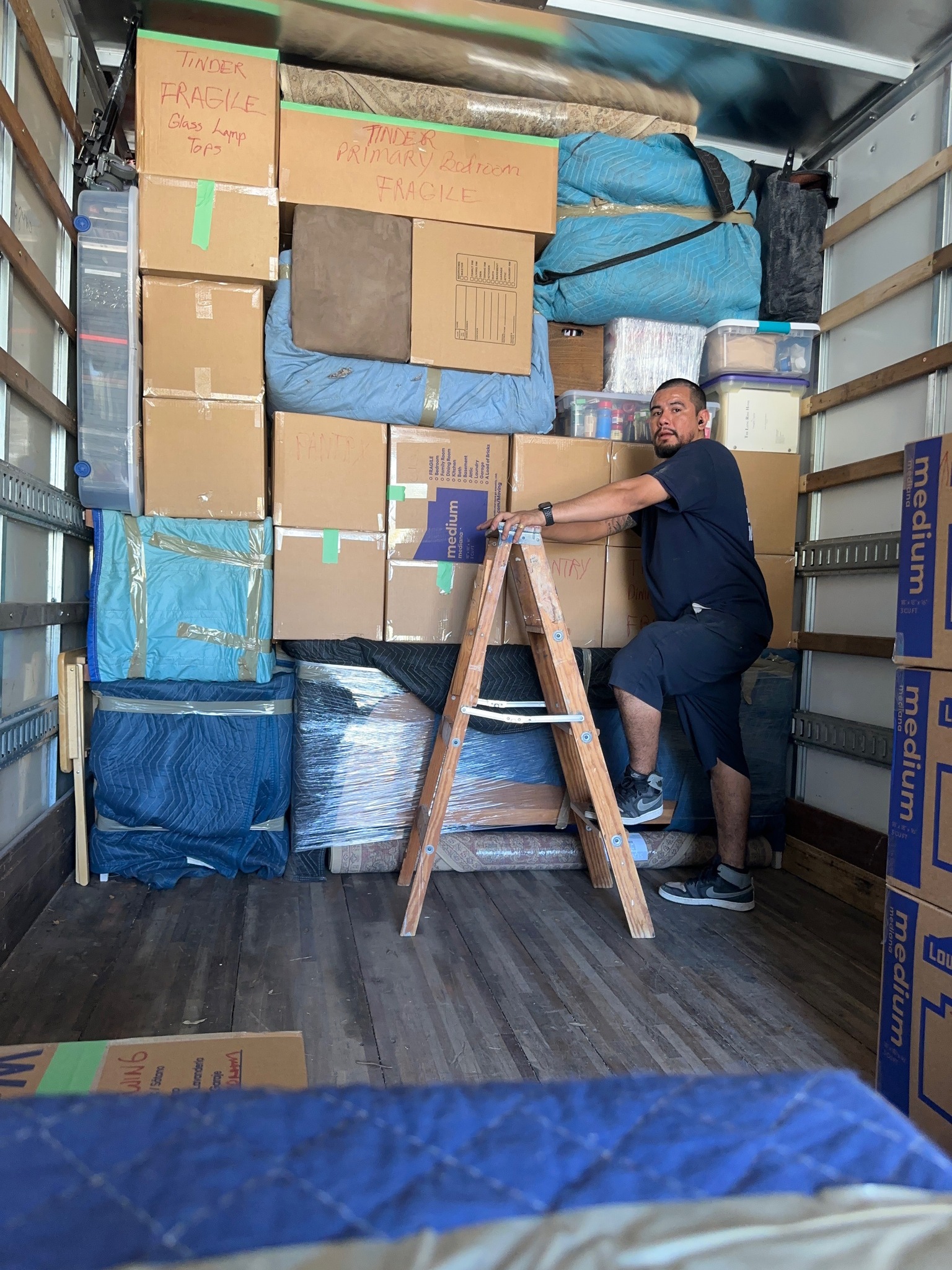 Loading items carefully into moving truck